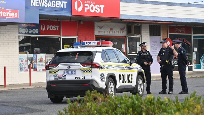 Police out the front of the supermarket the morning of the stabbing. Picture: Keryn Stevens