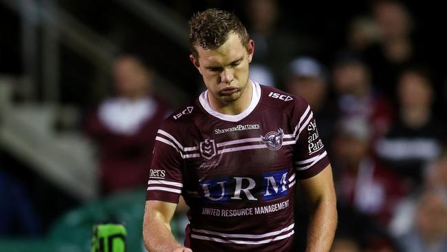 Manly's Tom Trbojevic leaves the field with a pectoral injury. Picture. Phil Hillyard