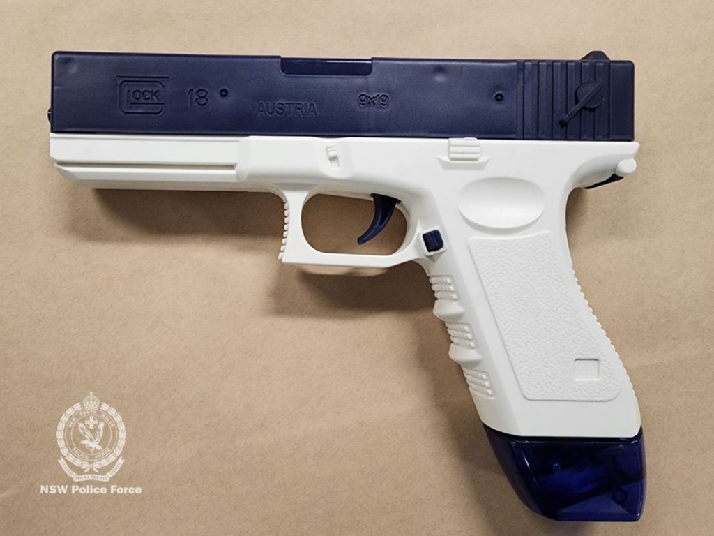 A man allegedly was in possession of a water pistol that resembled a ‘Glock’. Picture: NSW POLICE