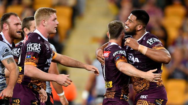 Payne Haas celebrates his try with Tom Flegler and Jake Turpin. Picture: AAP Image/Darren England