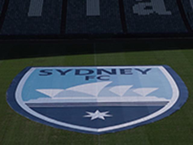 The new Sydney FC logo displayed on the field at Allianz Stadium.