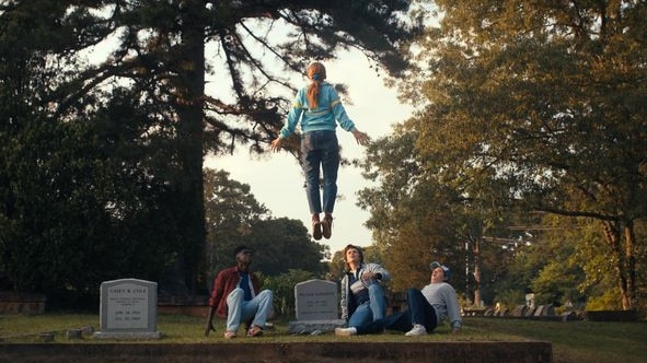 Caleb McLaughlin as Lucas, Sadie Sink as Max, Joe Keery as Steve, and Gaten Matarazzo as Dustin in Stranger Things.