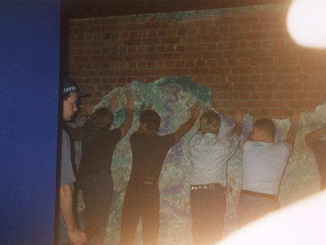 Police strip search patrons of Tasty's gay nightclub in 1994.