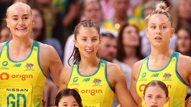 SYDNEY, AUSTRALIA - OCTOBER 30: Jo Weston, Amy Parmenter, Jamie-Lee Price and Kira Austin of Australia sing the national anthem before game two of the International Test series between the Australia Diamonds and the England Roses at Qudos Bank Arena on October 30, 2022 in Sydney, Australia. (Photo by Mark Kolbe/Getty Images for Netball Australia)