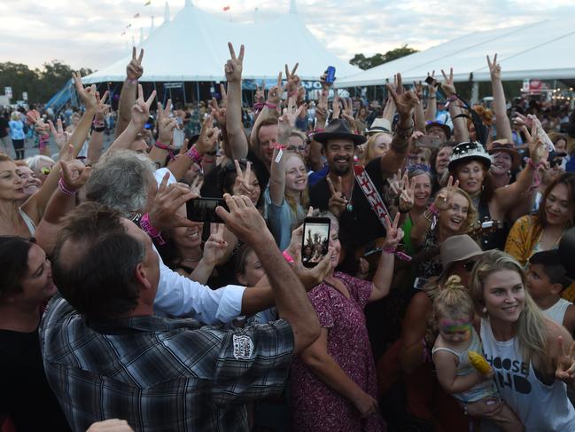 Michael Franti performs out in the general area with crowds at Bluesfest 2018 in Tyagarah near Byron Bay.