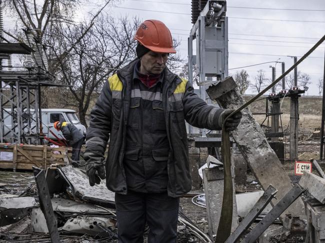 KYIV REGION, UKRAINE - NOVEMBER 04: Workers repair infrastructure in a power plant that was damaged by a Russian air attack in October, on November 04, 2022 in Kyiv Oblast, Ukraine. Electricity and heating outages across Ukraine caused by missile and drone strikes to energy infrastructure have added urgency preparations for winter. (Photo by Ed Ram/Getty Images)