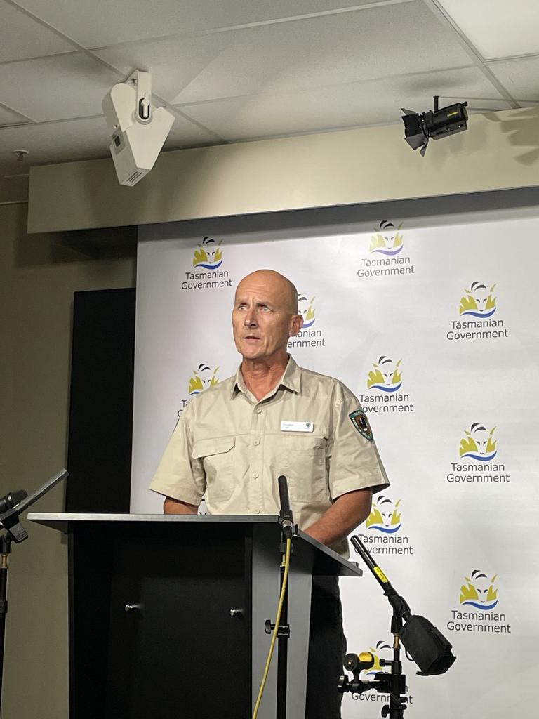 Tasmania Parks and Wildlife's Brendan Clark provides update of mass whale stranding near Arthur River. Picture: Genevieve Holding