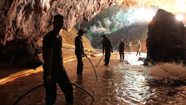 Thai Navy soldiers in the flooded Tham Luang cave during rescue operations for the 12 boys and their football team coach trapped in the cave at Khun Nam Nang Non Forest Park in the Mae Sai district of Chiang Rai province. Picture: Royal Thai Navy