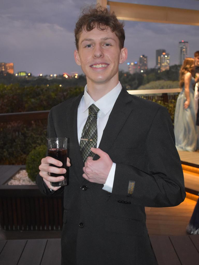 QACI students shine at formal | The Courier Mail