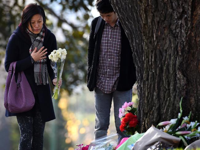 Mourners lay flowers in Kings Domain in memory of Renea Lau. Picture: Nicole Garmston