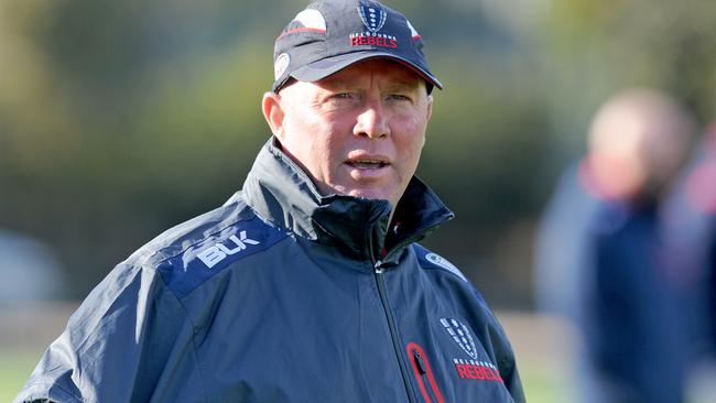 Rebels coach Tony McGahan watches his players, during the captain's run