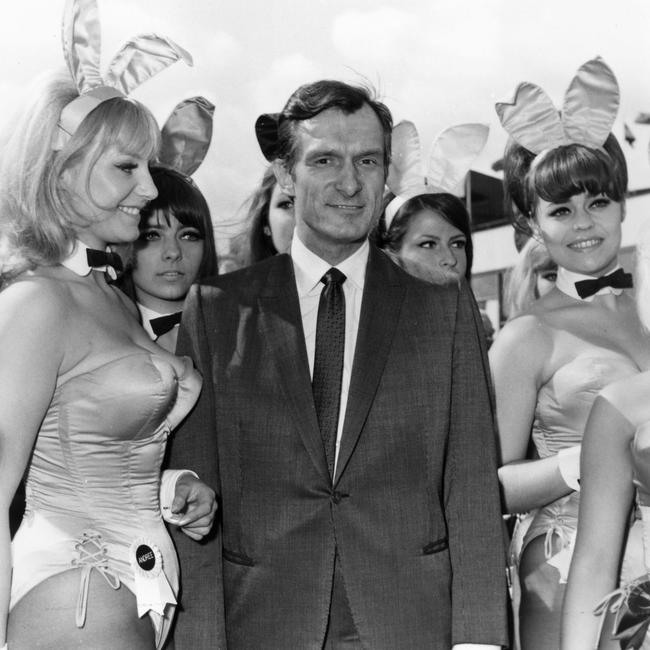 Playboy editor and tycoon Hugh Hefner is greeted by a group of bunny girls from his Playboy Clubs, upon his arrival at London Airport. Picture: Getty