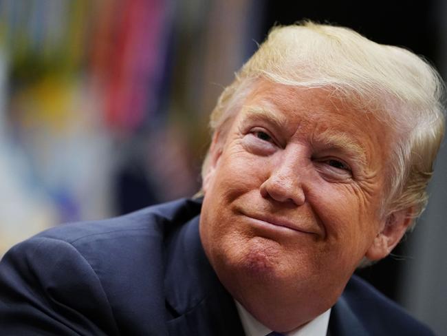 US President Donald Trump speaks during a roundtable discussion on the Foreign Investment Risk Review Modernization Act in the Roosevelt Room of the White House on August 23, 2018. (Photo by MANDEL NGAN / AFP)