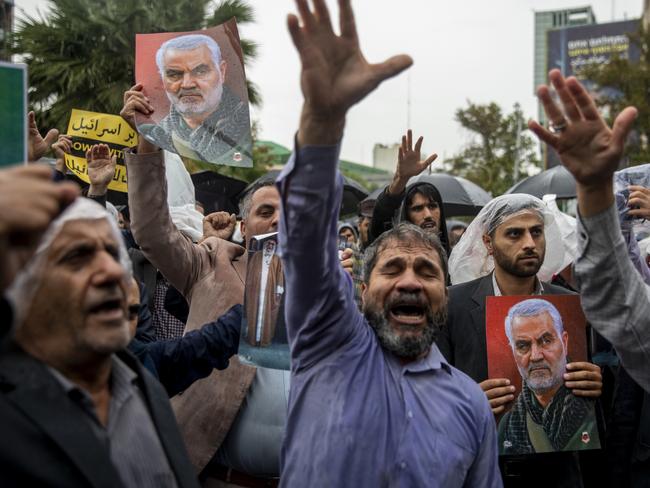 TEHRAN, IRAN - SEPTEMBER 28: Iranians protest with anti-Israeli and anti-American slogans while participating in a protest rally to condemn the Israeli airstrike in Lebanon that killed Hassan Nasrallah and several Hezbollah commanders in Tehran, Iran,on September 28, 2024 in Tehran, Iran. Israel announced earlier that it had killed Hassan Nasrallah, leader of the Iran-backed Lebanese militant and political group Hezbollah, in overnight strikes on southern Beirut. (Photo by Majid Saeedi/Getty Images)