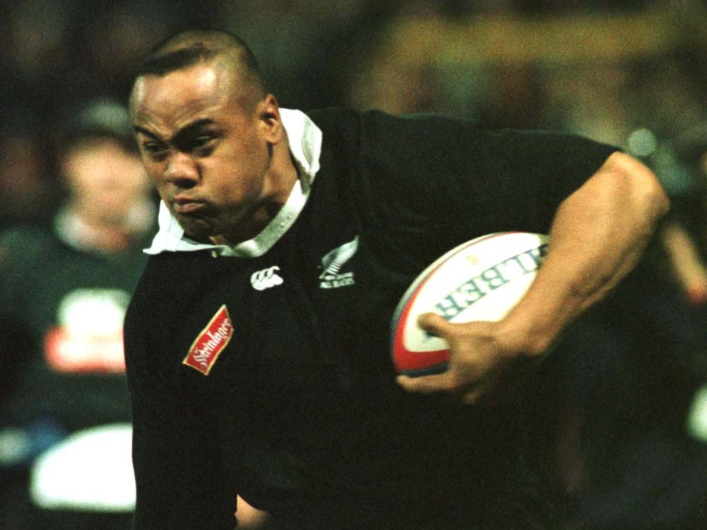 All Black Jonah Lomu heads for the tryline against an Emerging England side.