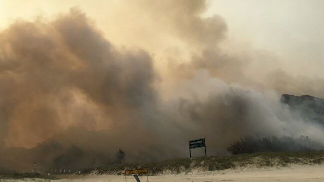 Authorities and residents are fighting to protest homes in Happy Valley. Picture: Queensland Ambulance Service