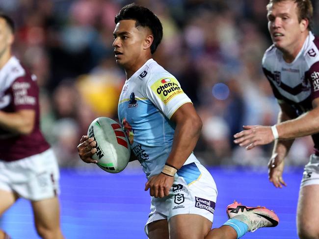 Keano Kini of the Titans runs the ball during the round 20 NRL match between Manly Sea Eagles and Gold Coast Titans. Picture: Brendon Thorne/Getty Images.