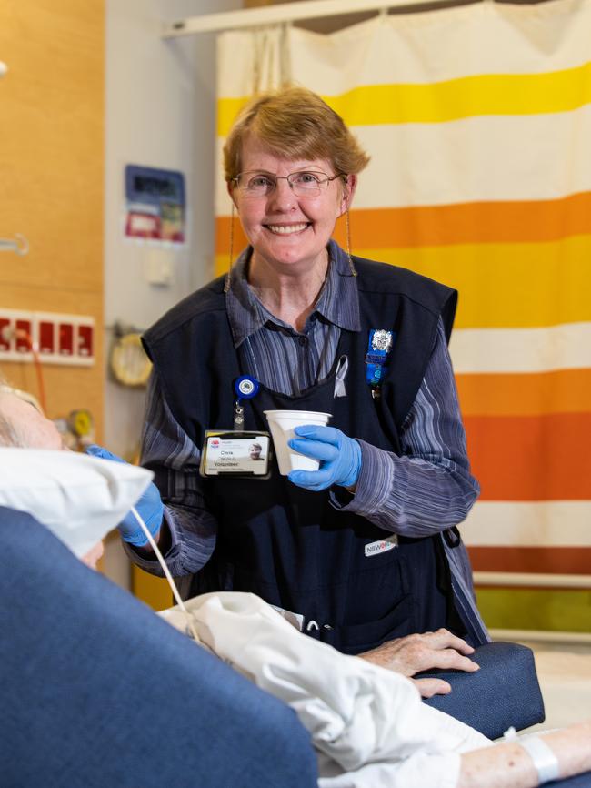 DoSomething Day 2018.Pictures taken on 25th July 2018 at Royal North Shore Hospital of volunteer feeder Chris Oberle from Wollstonecraft feeding a patient their lunch. (AAP Image / Julian Andrews).