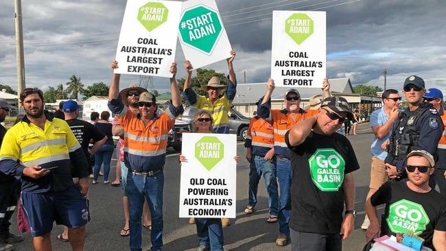 Hundreds of mining supporters, including Dave Taylor,  line up in Clermont  as the Stop Adani Convoy approaches. Picture: Facebook