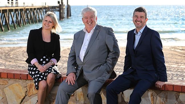 Hoffman travel heads at Glenelg jetty with sea in background