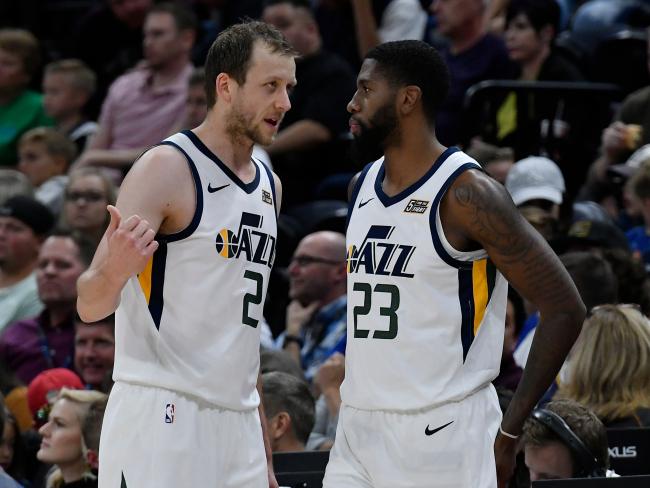 Joe Ingles and Utah teammate Royce O'Neale chat during their victory over the 36ers. Picture: Getty