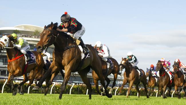 Runners at the inaugural twilight meeting at Flemington. Picture: AAP