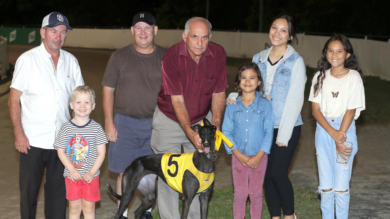 Long-serving Ipswich greyhound official and trainer Merv Page with connections celebrating the win of Sizzling Babe. Picture: justgreyhoundphotos.com.au