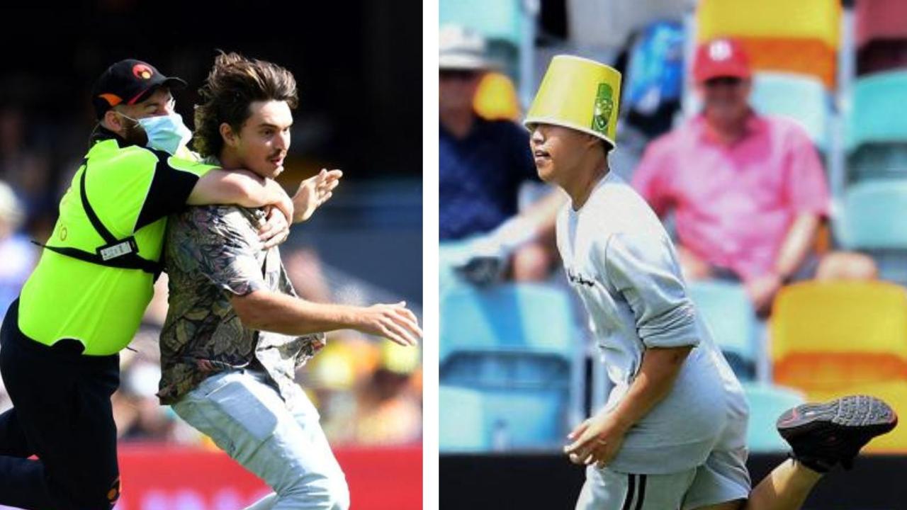 Pitch invaders ran onto the Gabba. Photo: Getty Images