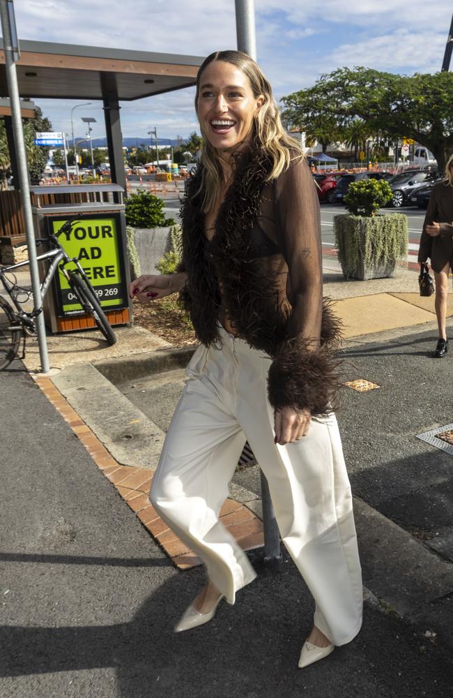 Ellidy Pullin wore a pair of cream pants with a sheer cardigan featuring a fluffy trim. Picture: Media Mode