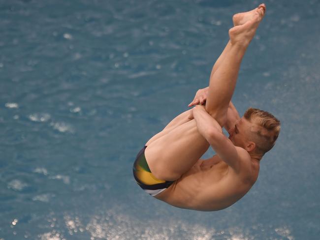 Australia's Grant Nel competes in the Men's 3m Springboard Preliminary during the diving event at the Rio 2016 Olympic Games at the Maria Lenk Aquatics Stadium in Rio de Janeiro on August 15, 2016. / AFP PHOTO / CHRISTOPHE SIMON