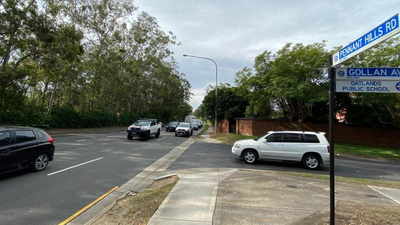 Traffic leaving Gollan Ave into Pennant Hills Rd.