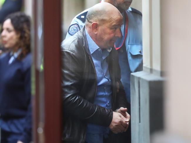 Frank Madafferi is taken from a prison van into the Supreme Court in Victoria in 2017. Picture: David Crosling