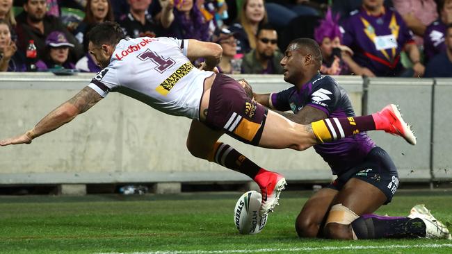 MELBOURNE, AUSTRALIA - SEPTEMBER 22:  Darius Boyd of the Brisbane Broncos is challenged by Suliasi Vunivalu of the Storm  during the NRL Preliminary Final match between the Melbourne Storm and the Brisbane Broncos at AAMI Park on September 22, 2017 in Melbourne, Australia.  (Photo by Robert Cianflone/Getty Images)