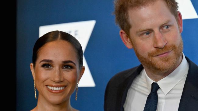 (FILES) Prince Harry, Duke of Sussex, and Meghan, Duchess of Sussex, arrive at the 2022 Robert F. Kennedy Human Rights Ripple of Hope Award Gala at the Hilton Midtown in New York City on December 6, 2022. Prince Harry and wife Meghan Markle were involved in a "near catastrophic car chase" involving paparazzi in New York late on May 16, 2023, a spokesperson for the couple said May 17. "This relentless pursuit, lasting over two hours, resulted in multiple near collisions involving other drivers on the road, pedestrians and two NYPD officers," the spokesperson added. (Photo by ANGELA WEISS / AFP)