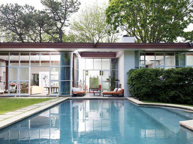 Vogue's editor-at-large Candy Pratts is selling off the stylish home she shares with her husband, acclaimed American artist Chuck Price. While Price's work appears in the MoMA and other major galleries and museums Pratts has been working with 'The Devil Wears Prada' inspiration Anna Wintour for years. Their three-bedroom, 3.5-bathroom house, in the swanky New York Hamptons near Wintour, is listed for $2.85 million by Jane Gill at the elite Saunders and Associates real estate firm. Displaying the 