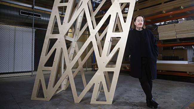 Powerhouse Museum director Lisa Havilah poses with a model of the outer structure of the new Parramatta building on Tuesday. Picture: Adam Yip