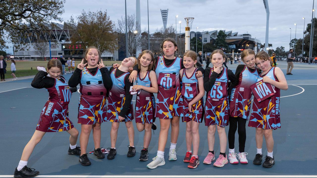 Newcomb under-11 netball team pull their funniest faces.