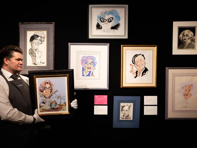 A member of staff with 'The Dame', by Don Lindsay at Christie’s. Picture: PA Images via Getty Images