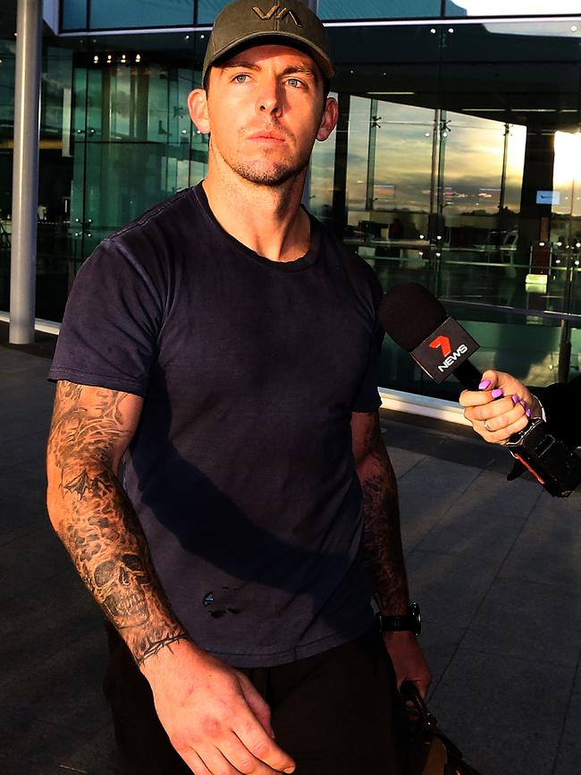 Constable Zach Rolfe arriving at Canberra Airport.