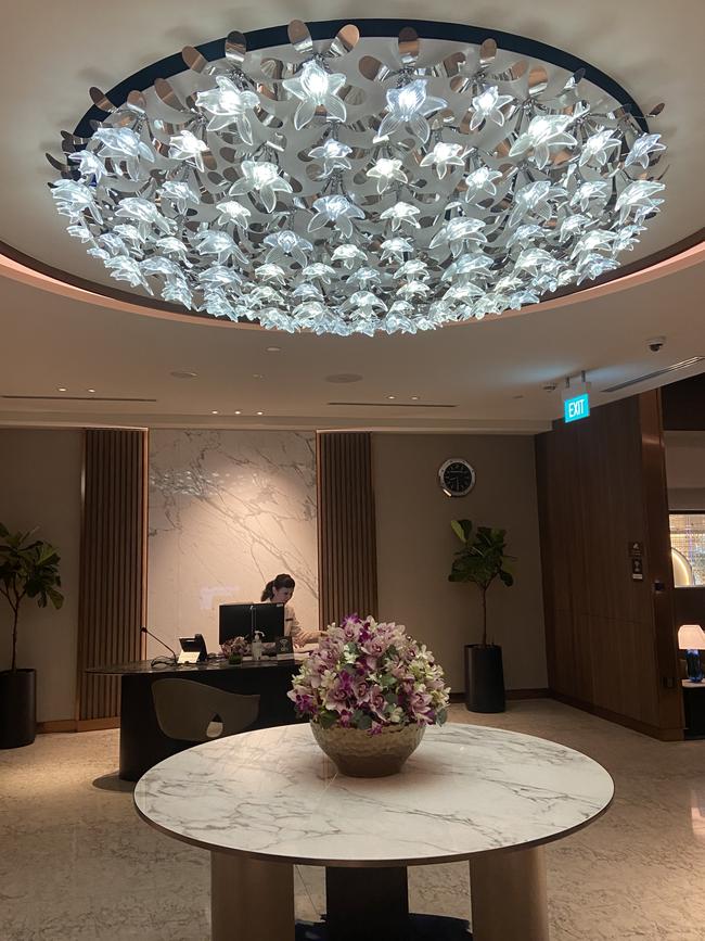 The crystal flower chandelier in the foyer of the Private Room.