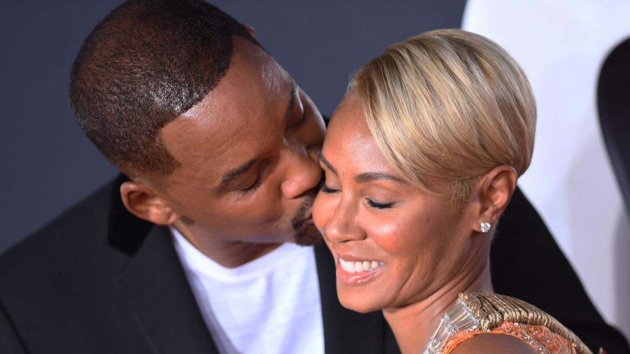 Will and Jada share a kiss on a 2019 red carpet - three years after they’d privately broken up. Picture: AFP