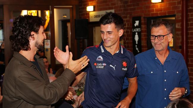 Peter Daicos with his sons and Collingwood stars Josh and Nick at last year’s draft announcement. Picture: Mark Stewart