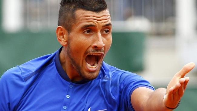 Nick Kyrgios yells at a ball boy during his first round match at the French Open.