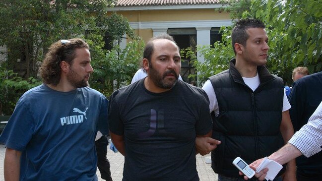 Tony Mokbel coming out of the trial in the court yard in Greece in 2007. 