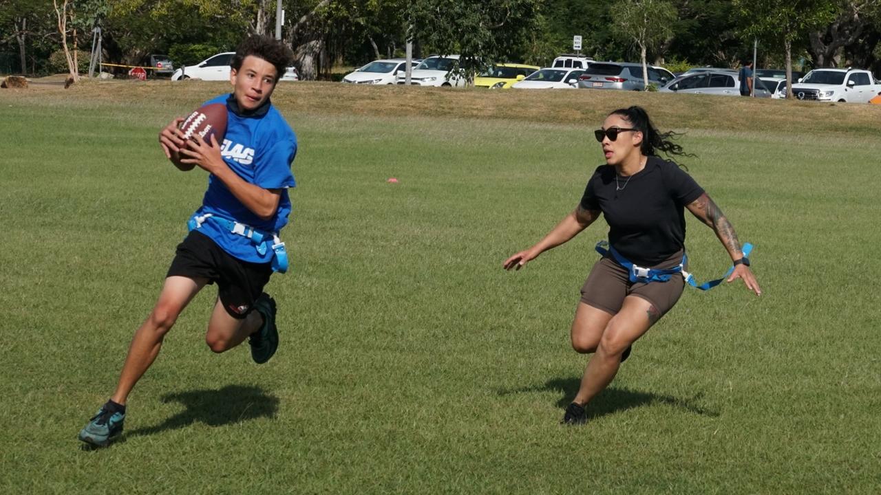Darwin Middle School students playing Flag Football against United States Marines at DMS, 19 May 2025. Picture: Jason McIntosh