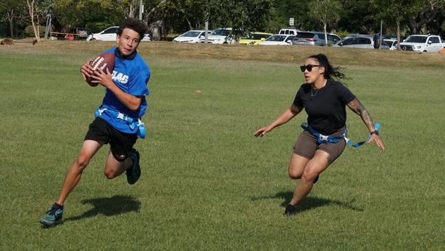 Darwin Middle School students playing Flag Football against United States Marines at DMS, 19 May 2025. Picture: Jason McIntosh