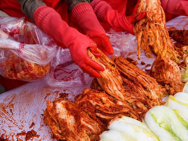 Scientists say a daily dose of kimchi could be the key to tackling obesity and abdominal fat.