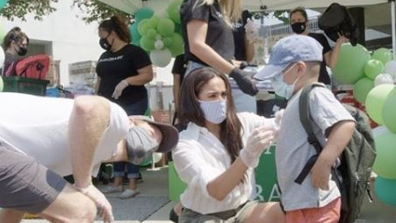 Meghan Markle and Prince Harry volunteer at a school charity drive in Los Angeles. Picture: Instagram