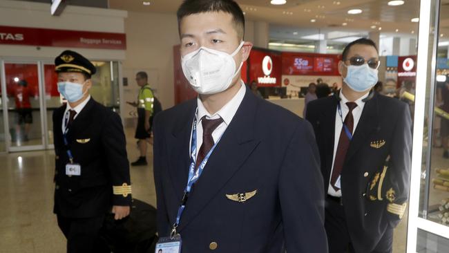 Flight crew, above from China Eastern Airlines Flight MU749. Picture: AP