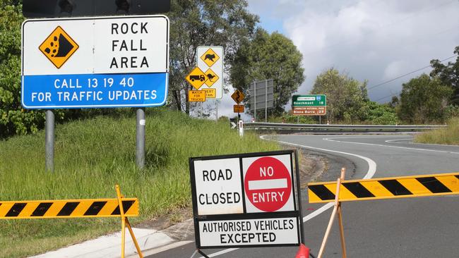 Signs on Lower Beechmont Rd at the bottom of the mountain. Picture: Glenn Hampson